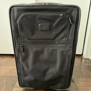 Tumi carry on suitcase